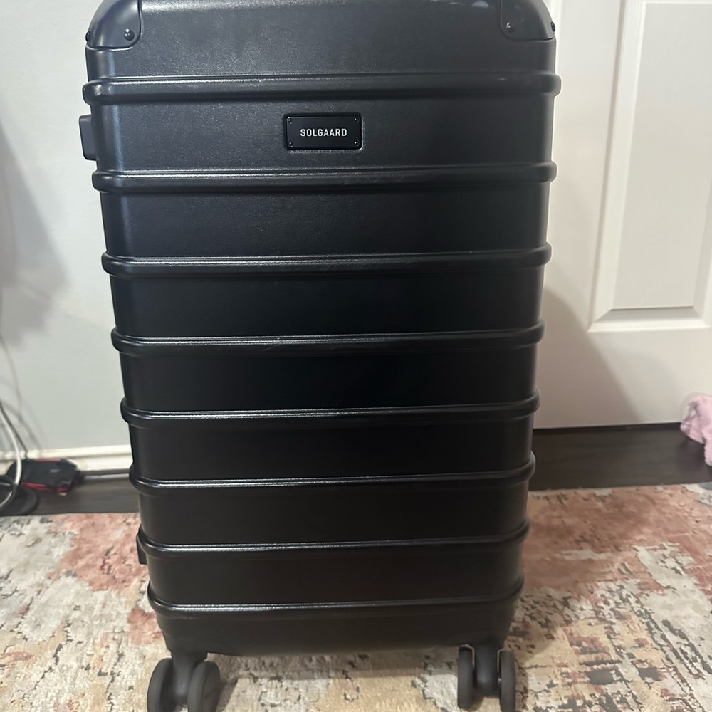 Solgaard Black Spinner Check in Medium Suitcase